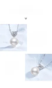 Detail of S925 silver necklace featuring heart-cut moissanite and round freshwater pearl