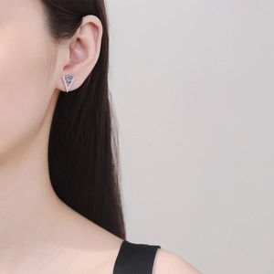S925 sterling silver V-shape stud earrings with brilliant moissanite stones on model