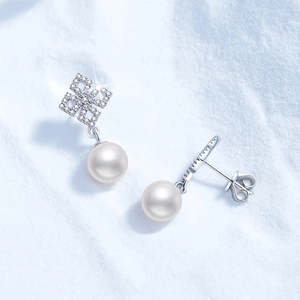 Elegant 925 sterling silver stud earrings with white freshwater pearls and moissanite stones