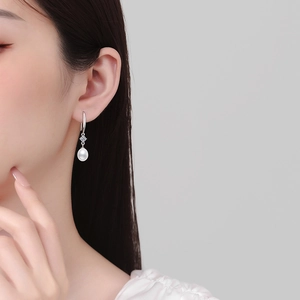 Elegant S925 sterling silver drop earrings featuring white pearls and moissanite accents
