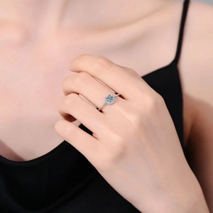 Elegant S925 sterling silver halo moissanite ring worn on hand with a round center stone