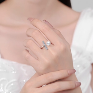 Elegant S925 silver open ring featuring a white freshwater pearl and sparkling zircons