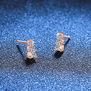 Rose gold 925 silver stud earrings featuring three vertical moissanite stones