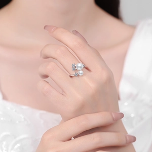 Elegant S925 sterling silver open ring featuring freshwater pearls and zircon accents