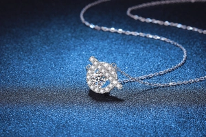 Macro shot of S925 silver pig nose pendant set with 1 carat D color moissanite stones