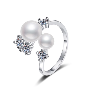 Adjustable S925 silver ring featuring dual freshwater pearls and sparkling moissanite stones