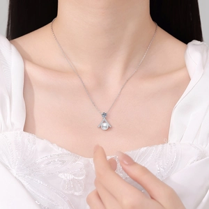 Elegant S925 sterling silver moissanite necklace with fan pendant and round white pearl