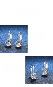 Macro detail of round brilliant cut moissanite earring with German polishing craft