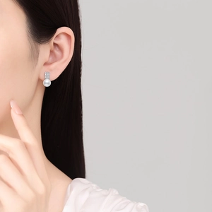 925 silver square sugar earrings with moissanite diamonds and white pearls shown on a model