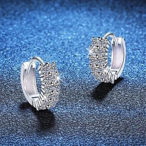 Elegant s925 sterling silver hoop earrings with full moissanite pavé on blue background