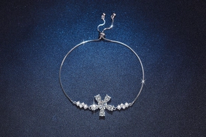 Macro shot of s925 silver adjustable cherry blossom bracelet with moissanite fire sparkle