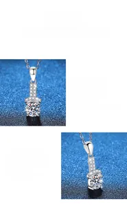 Macro detail of round brilliant moissanite pendant with elegant claw setting in S925 silver