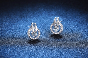 Close-up of S925 sterling silver halo stud earrings with D color moissanite stones