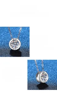 Vue macro d'un pendentif moissanite 1ct avec monture halo et finition argent poli