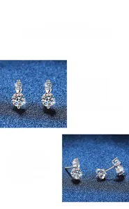 Macro detail of S925 silver moissanite earrings with heart-shaped claw setting and polish