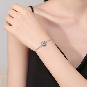Sparkling S925 sterling silver moissanite sunflower bracelet on model's wrist
