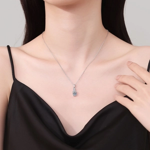 Elegant S925 sterling silver necklace with a round light blue moissanite pendant