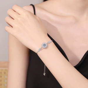 Adjustable S925 sterling silver bracelet featuring a sparkling moissanite sunflower charm