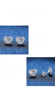Macro detail of S925 sterling silver heart-shaped moissanite earrings with fine polish