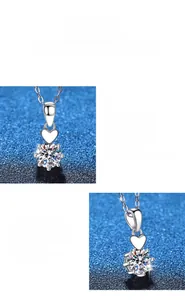 Detailed macro view of S925 sterling silver necklace with heart-shaped moissanite pendant