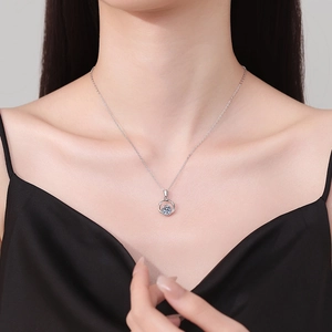 Elegant S925 sterling silver Mobius necklace with a brilliant blue Moissanite pendant