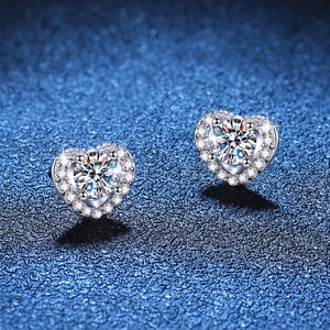 S925 sterling silver heart stud earrings with halo moissanite stones on blue background