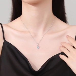 Elegant S925 sterling silver angel eye necklace with marquise cut moissanite on model