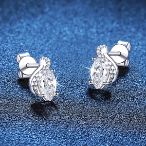 S925 sterling silver marquise cut moissanite stud earrings on a dark starry background