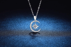 Macro shot of S925 silver crescent moon and star pendant necklace with moissanite