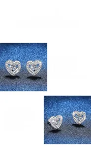 Macro view of heart-shaped moissanite earrings with S925 sterling silver prong setting
