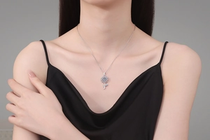Detailed view of S925 sterling silver sunflower pendant with blue moissanite and diamonds