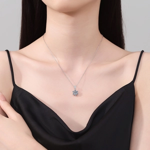 925 Sterling Silver Snowflake Necklace featuring a 1ct Moissanite pendant on a model