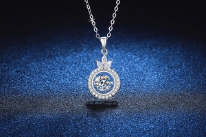 Macro shot of 925 silver crown necklace with shimmering moissanite dancing stone