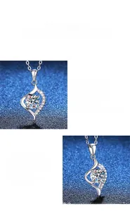 Macro shot of 925 silver heart necklace showing Moissanite sparkle and polished finish