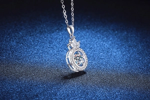 Close-up of S925 sterling silver dancing moissanite pendant with crown detail