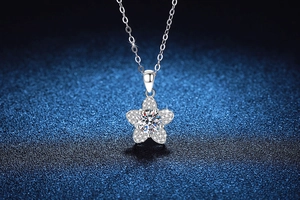 Macro shot of S925 sterling silver camellia pendant with 1ct moissanite diamond detail
