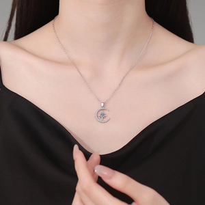 Elegant S925 sterling silver moon and star necklace with shimmering moissanite pendant