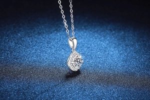 Close-up of S925 silver necklace featuring a square halo moissanite pendant