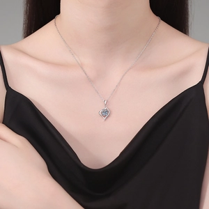 S925 sterling silver heart-shaped necklace with 1-carat moissanite on a female model