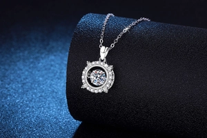 Close-up of S925 sterling silver moissanite pendant with dancing stone setting