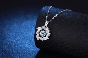 Macro view of S925 silver windmill pendant necklace with sparkling moissanite stones