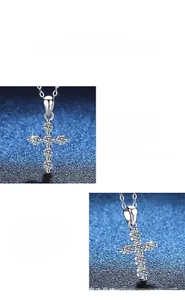 Detailed close-up of a s925 silver cross pendant necklace with round cut moissanite stones