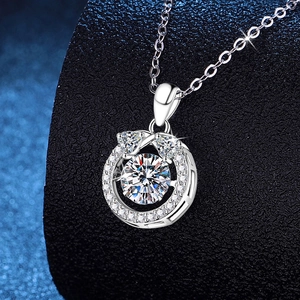 S925 sterling silver necklace with a brilliant 1ct moissanite heart pendant on dark stand