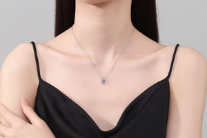 Close-up of S925 sterling silver necklace with a 1 carat moissanite rabbit ear pendant