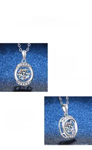 Macro detail of S925 silver necklace featuring a dancing round moissanite pendant