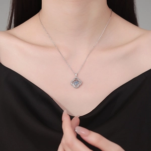 Elegant S925 silver necklace with sparkling 1 carat clover moissanite pendant on model