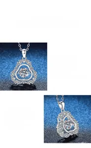 Macro detail of dancing Moissanite gourd pendant showing 1 carat sparkle and halo setting