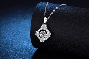 Close-up of S925 sterling silver crown pendant with shimmering round moissanite stone