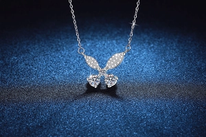 Detailed close-up of a 925 silver butterfly pendant necklace with moissanite stones