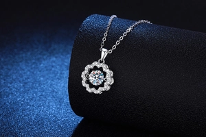 Macro shot of S925 sterling silver flower pendant with 1 carat moissanite and halo